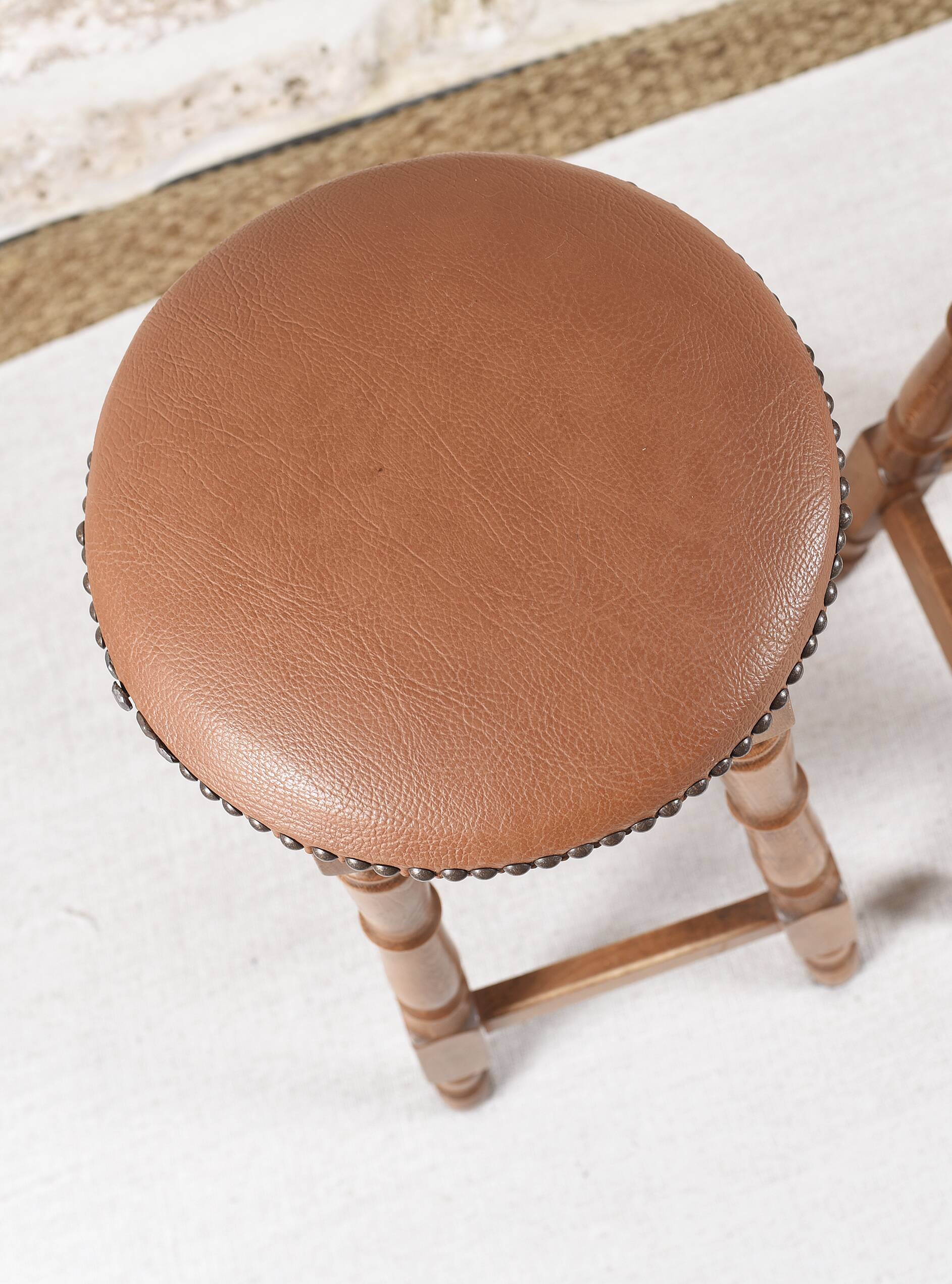 Antique bar stools, brown leather and wood