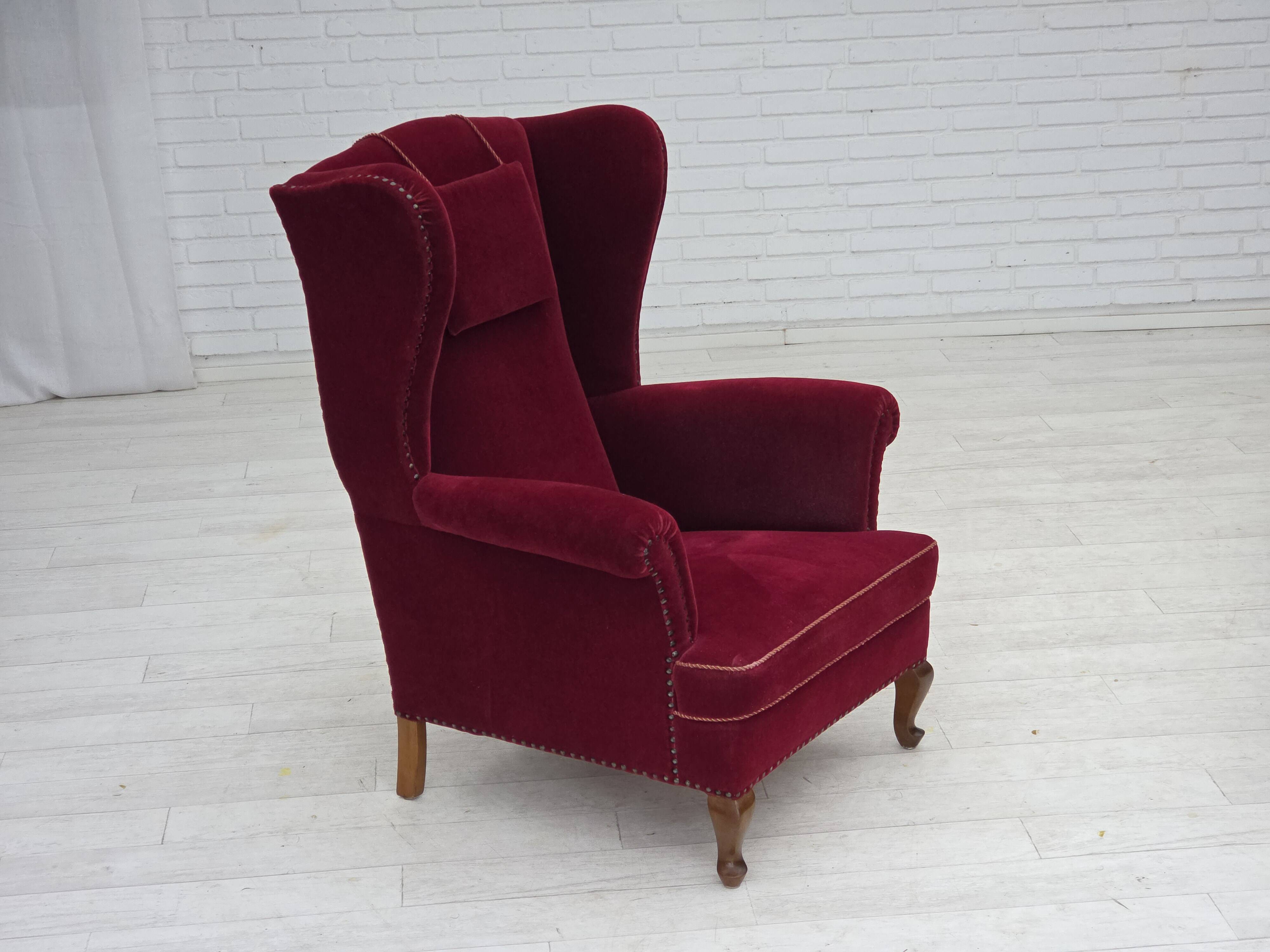 1960s, Danish highback wingback armchair, cherry-red furniture velour.