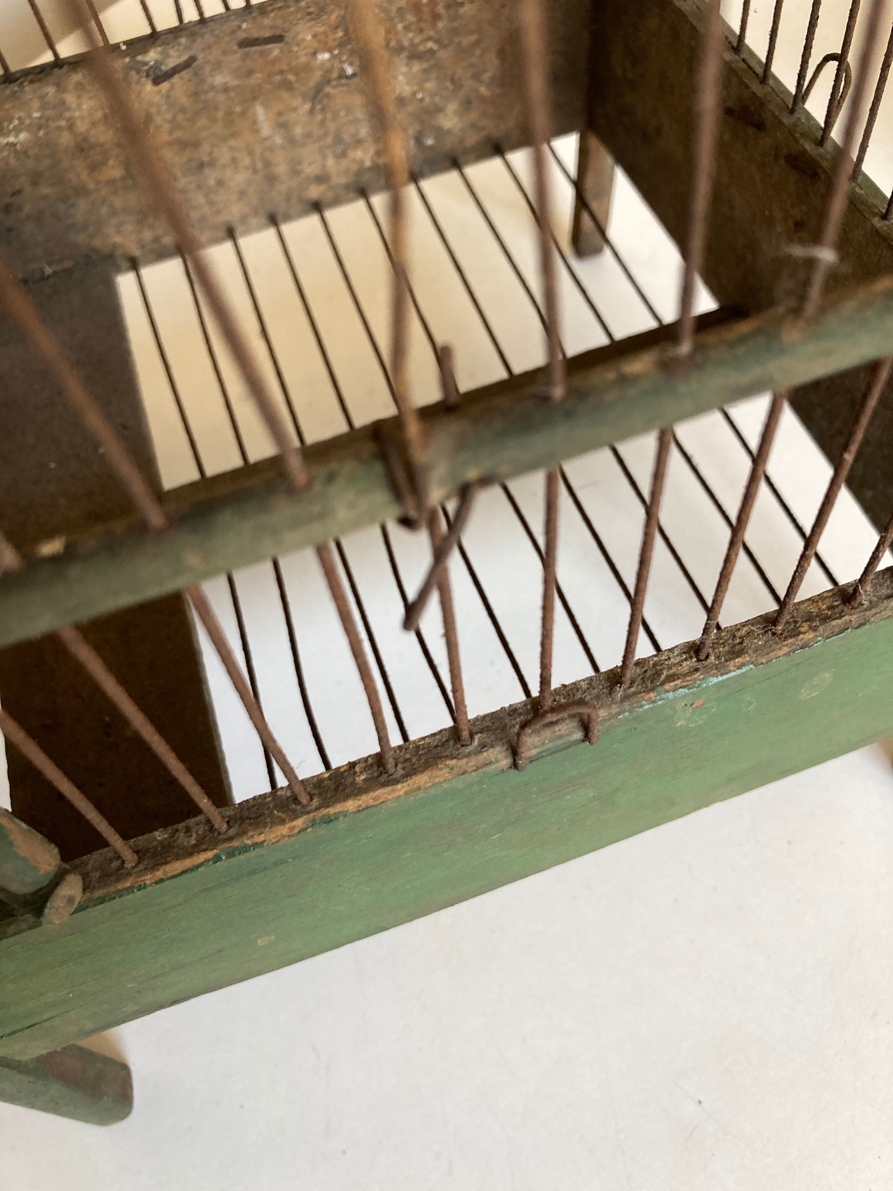 Octagonal bird cage made of wood and wire around 1920