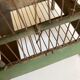 Octagonal bird cage made of wood and wire around 1920