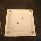 Digoin plate under pink earthenware