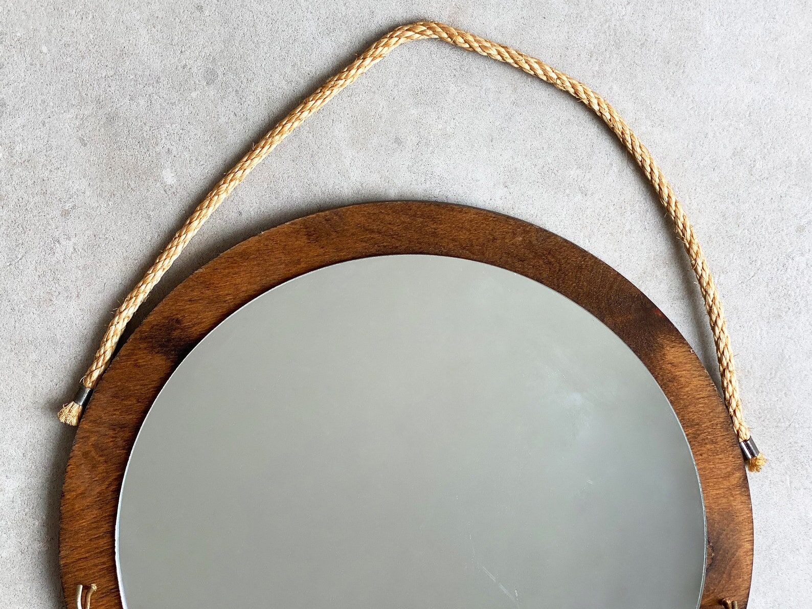 Vintage round wooden wall mirror with hooks