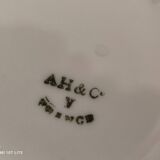 White porcelain sugar bowl decoration in relief and green and gold frieze