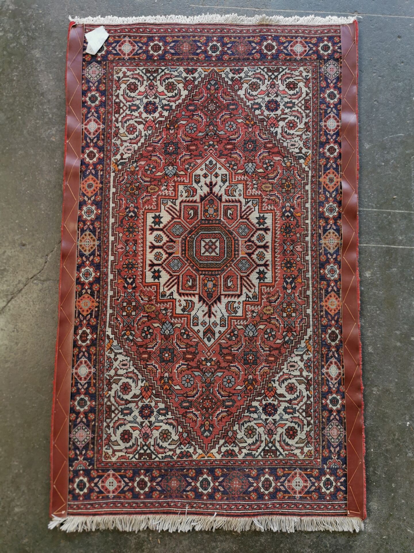 Hand-knotted Persian carpet from Iran, 128 x 76 cm.