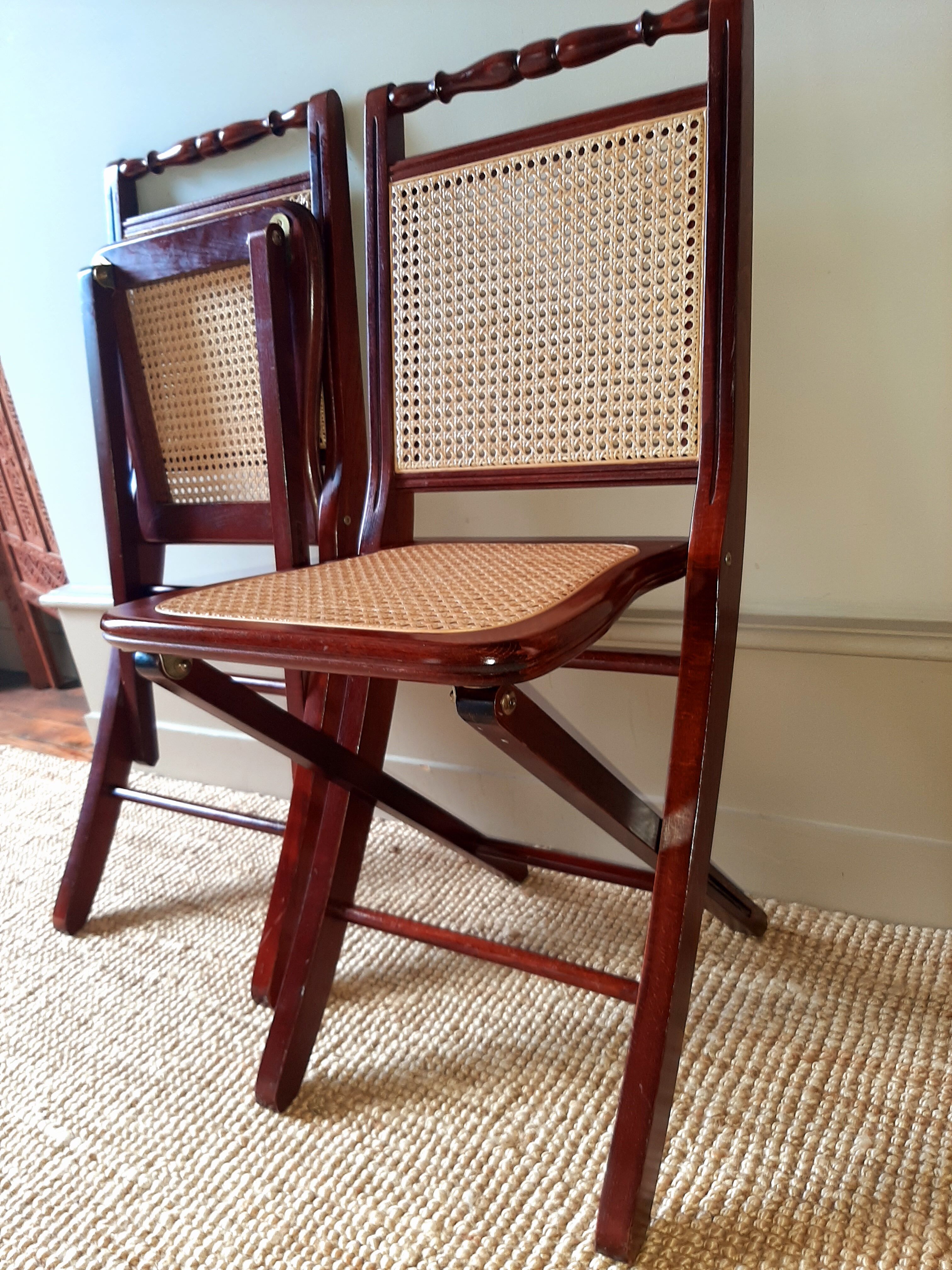 Folding wooden chairs and cannage