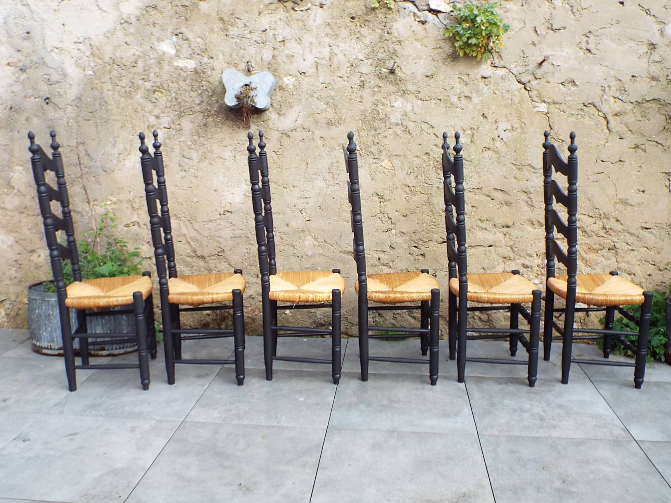 6 straw chairs with high backs
