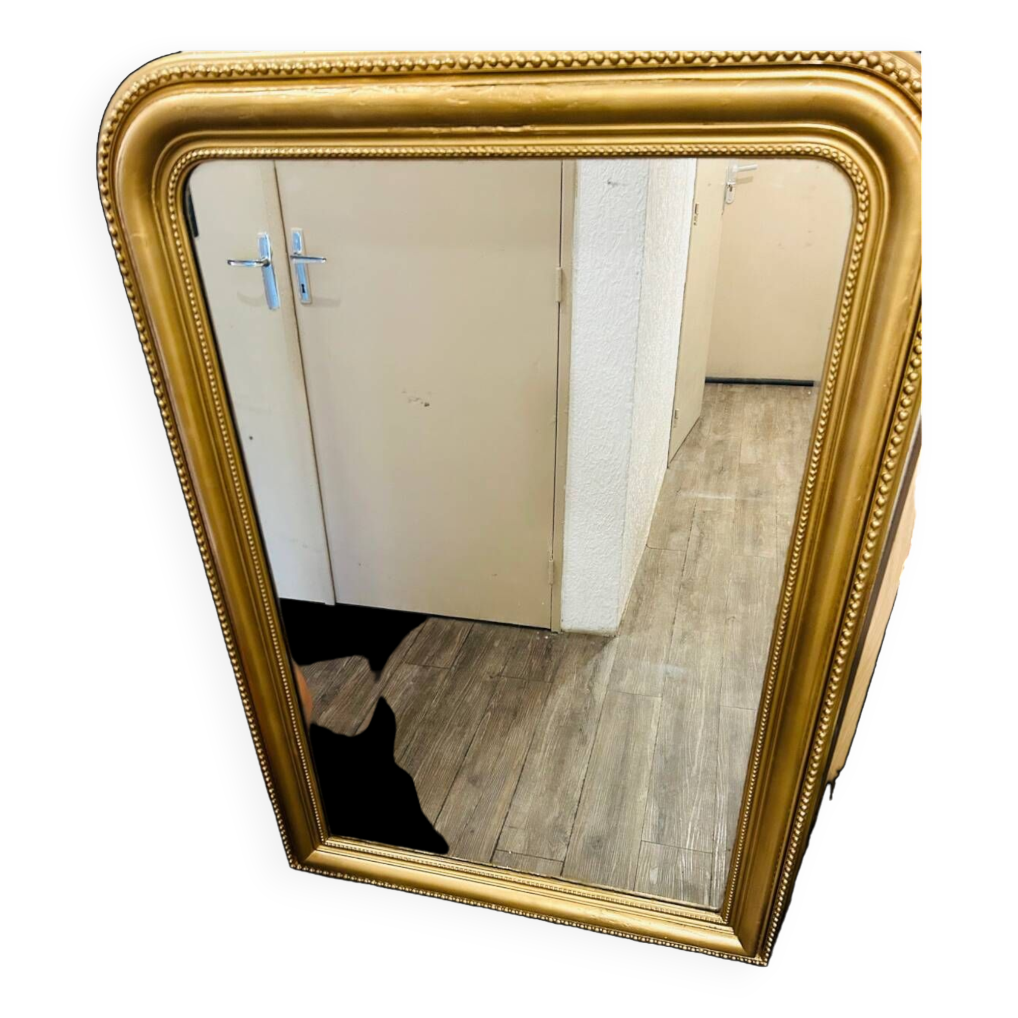Antique gilded mirror in old Louis Philippe wood