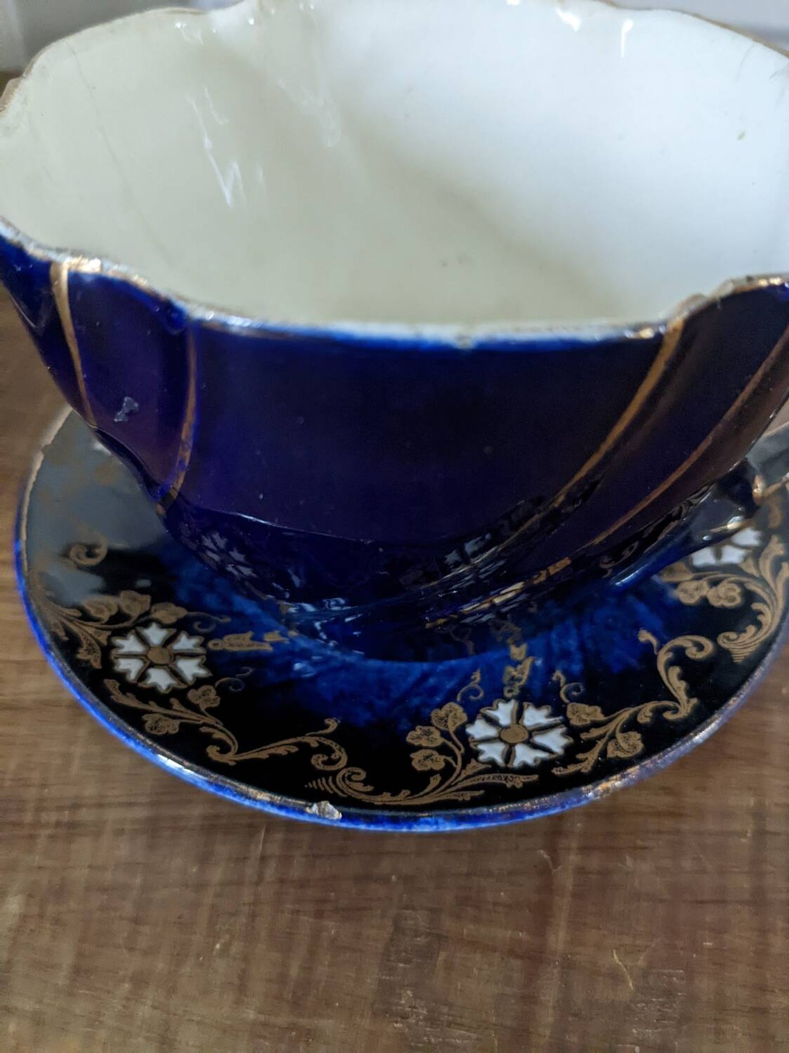 Set of two large Lunéville cups and saucers