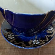 Set of two large Lunéville cups and saucers