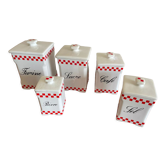 Series of red checkerboard spice jars