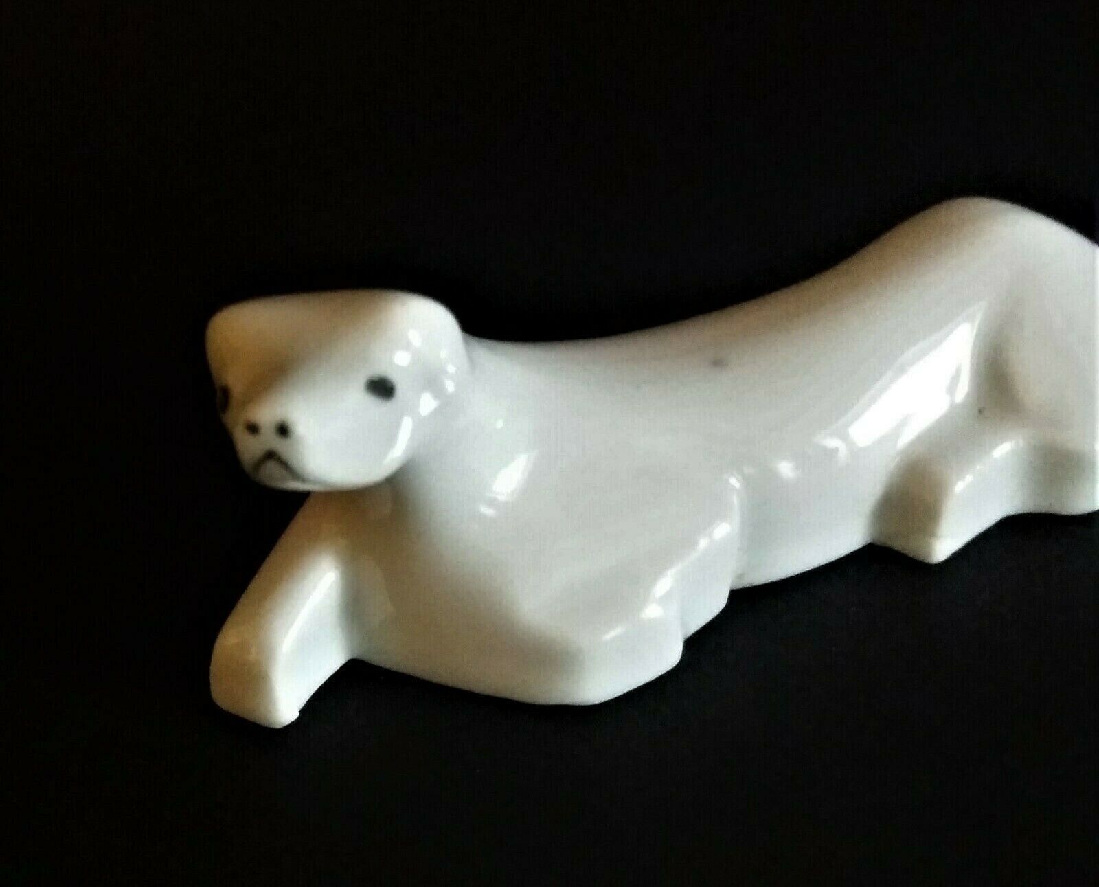 White porcelain knife holder sea lion