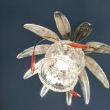 Chandelier with metal leaves and tassels