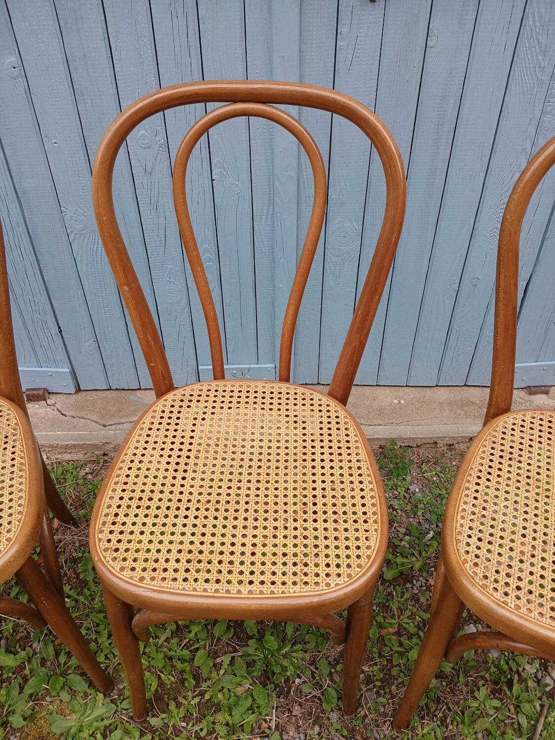 3 antique bistro chairs with canework