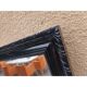 Black lacquered wood mirror "originally punctured"