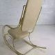 60s rocking chair in brass and ecru imitation leather