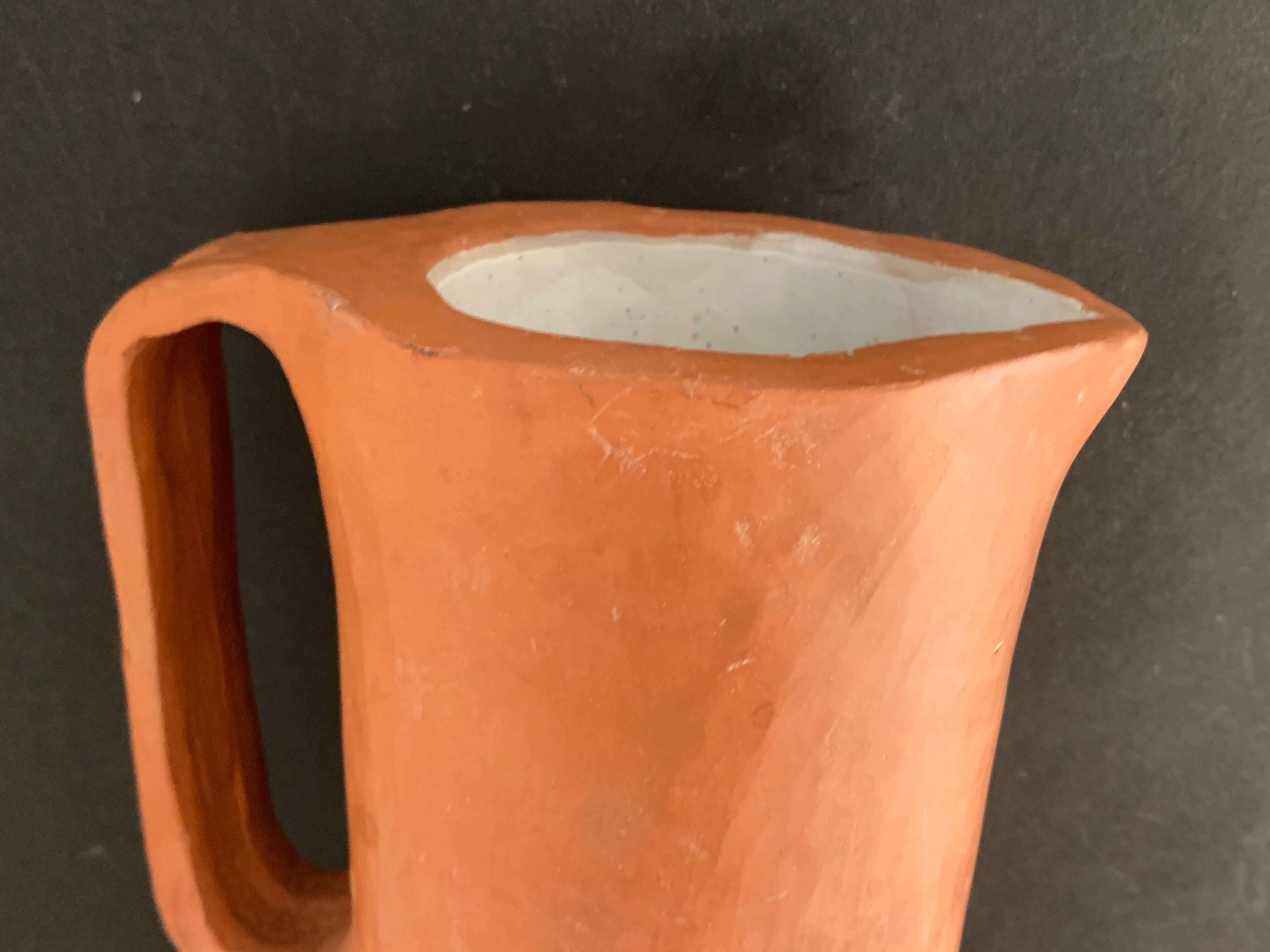 Signed terracotta pitcher or vase