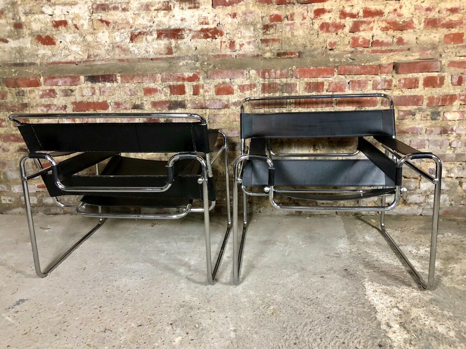 Pair of Marcel Breuer's Wassily armchairs in stainless steel and 60's leather