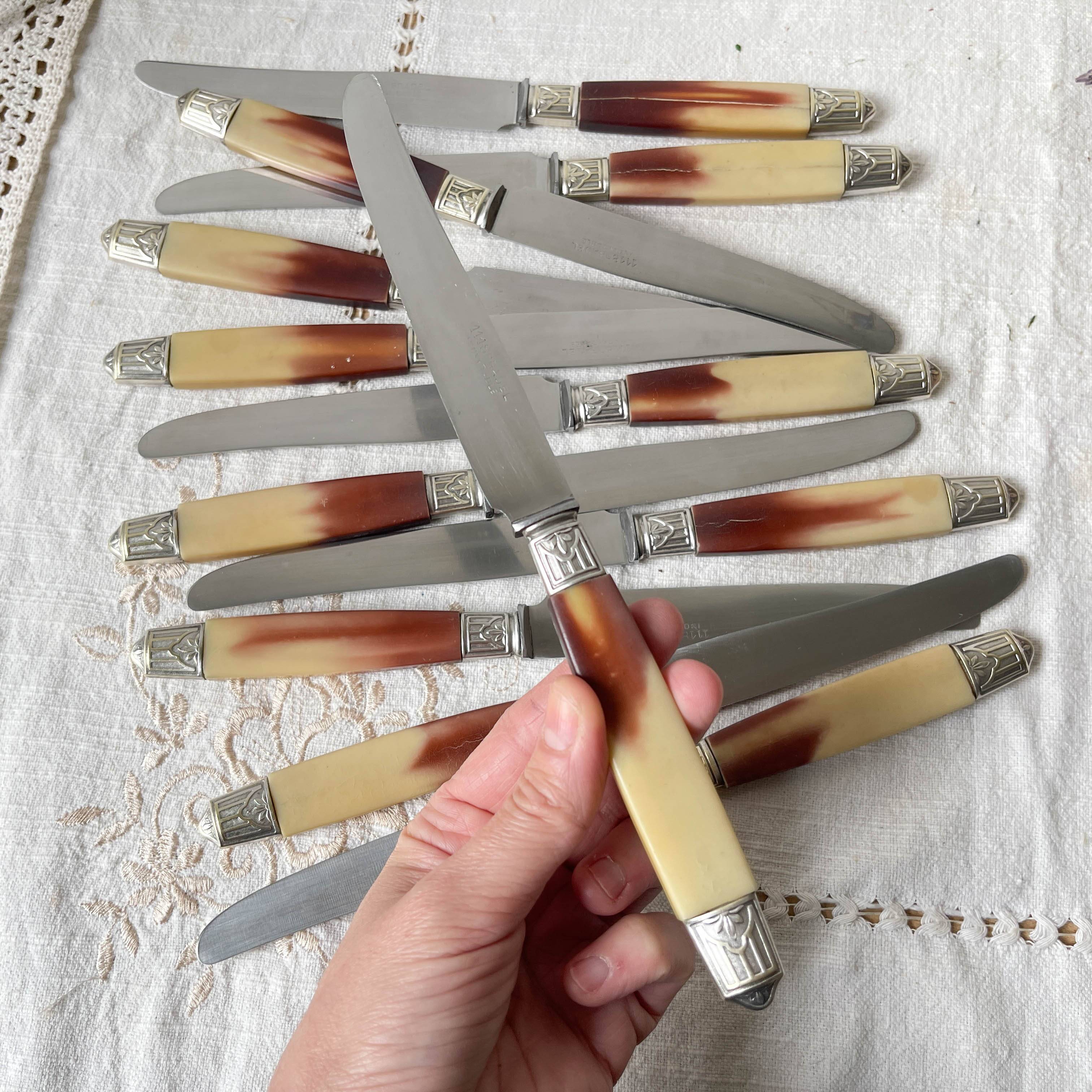 12 vintage Pradel stainless steel bakelite knives