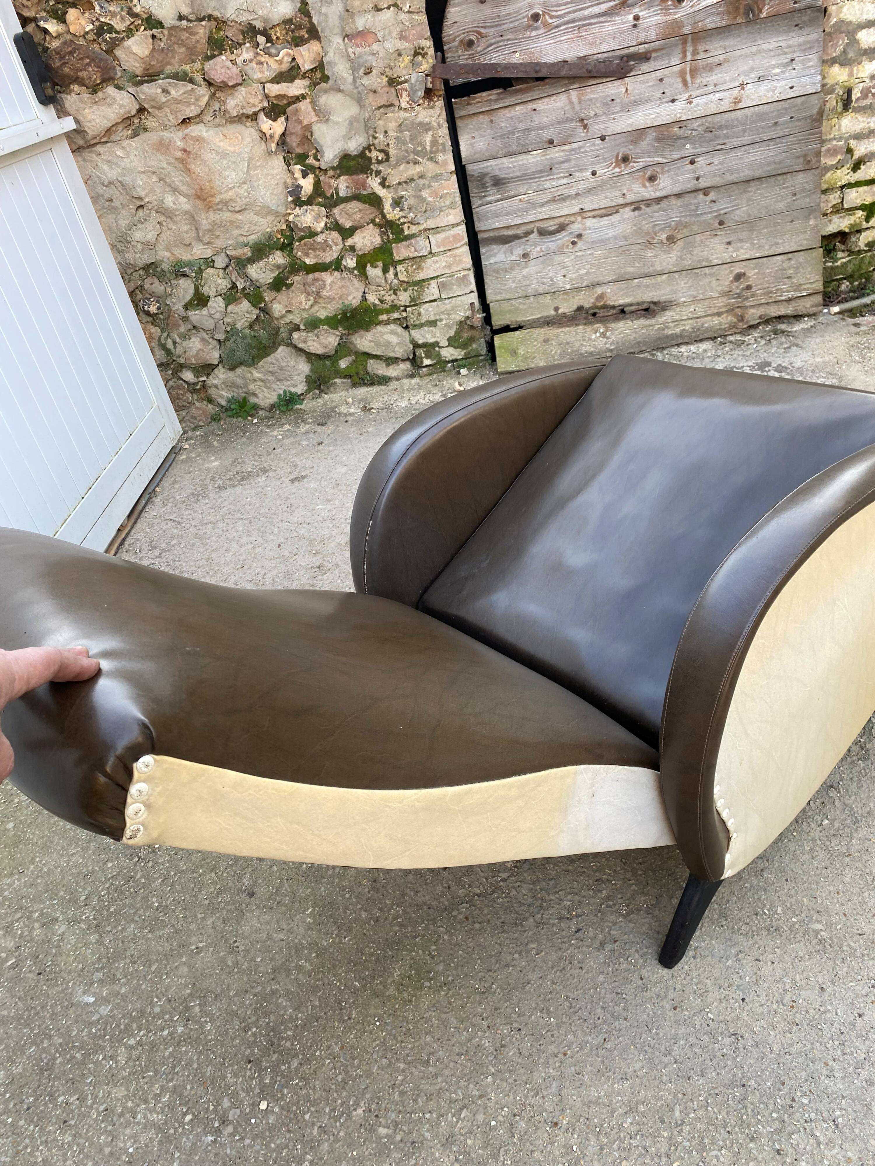 Vintage 50 faux leather reclining lounge chair with footrest