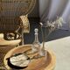 Coffee table in solid suar with central leg and spheres H56.5 D55.5