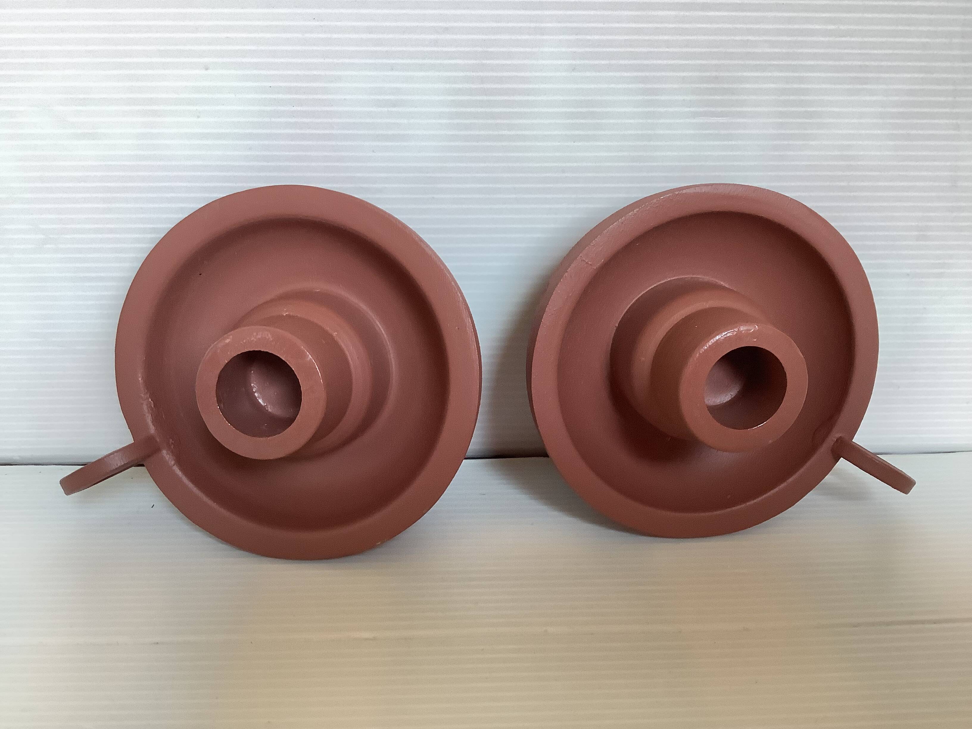 Pair of matte brown ceramic cellar rat candlesticks