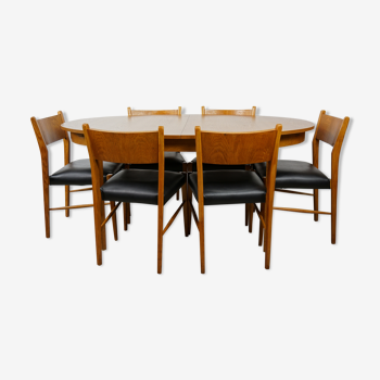 Wooden oval table and 6 matching chairs 60