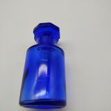 Old perfume bottle in cobalt blue glass