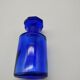 Old perfume bottle in cobalt blue glass