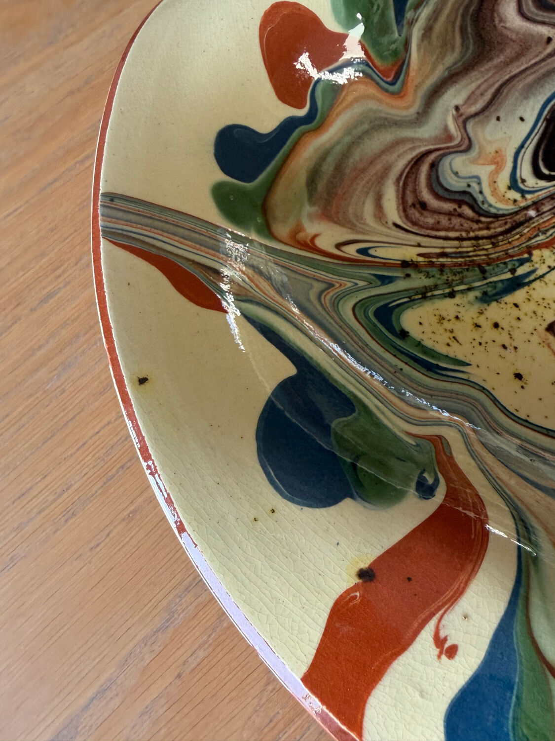 Glazed ceramic plate signed