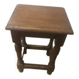 Small children's table (or coffee table) in brown varnished oak.