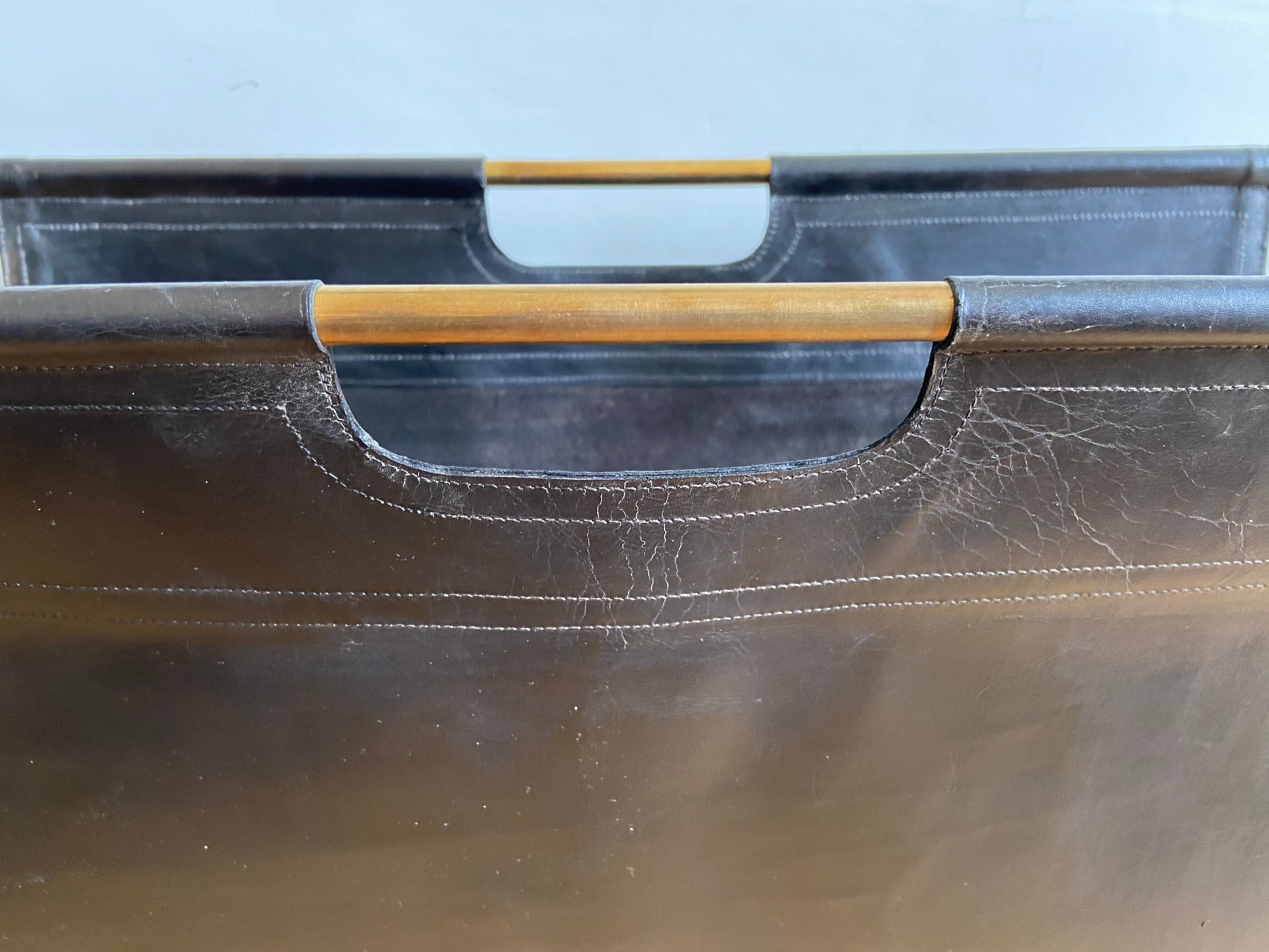 Leather and gilded brass magazine holder