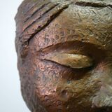 Buddha head sculpture, marble base