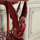 Athenian carved wood, red patina imitation of red marble