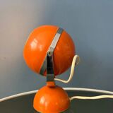 Orange mid-century space age eyeball table lamp