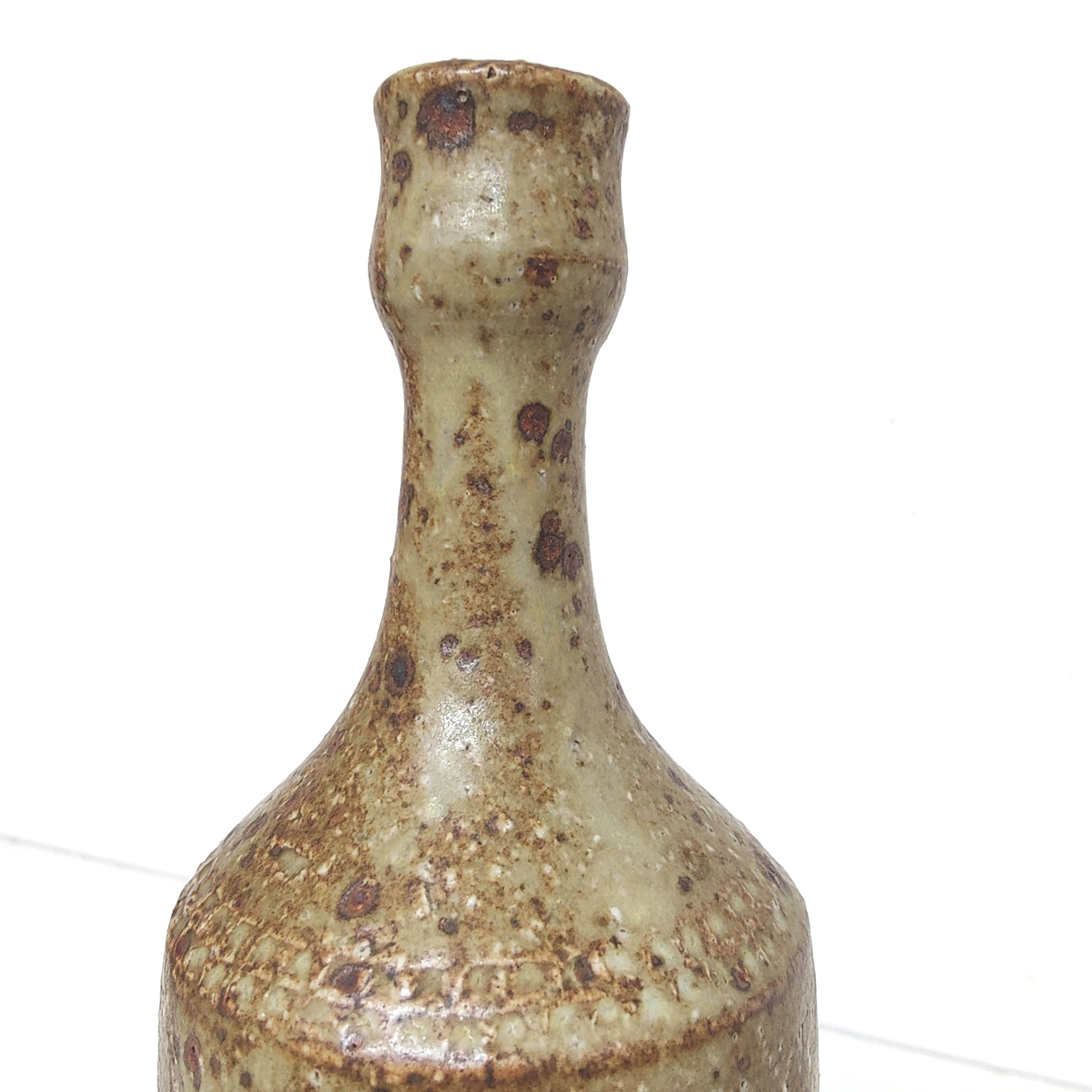Bottle vase in sandstone pyrite floral decoration signed