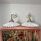 Two wall sconces in serrated white opaline