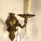 Pair of wall clams in gilded bronze stamps