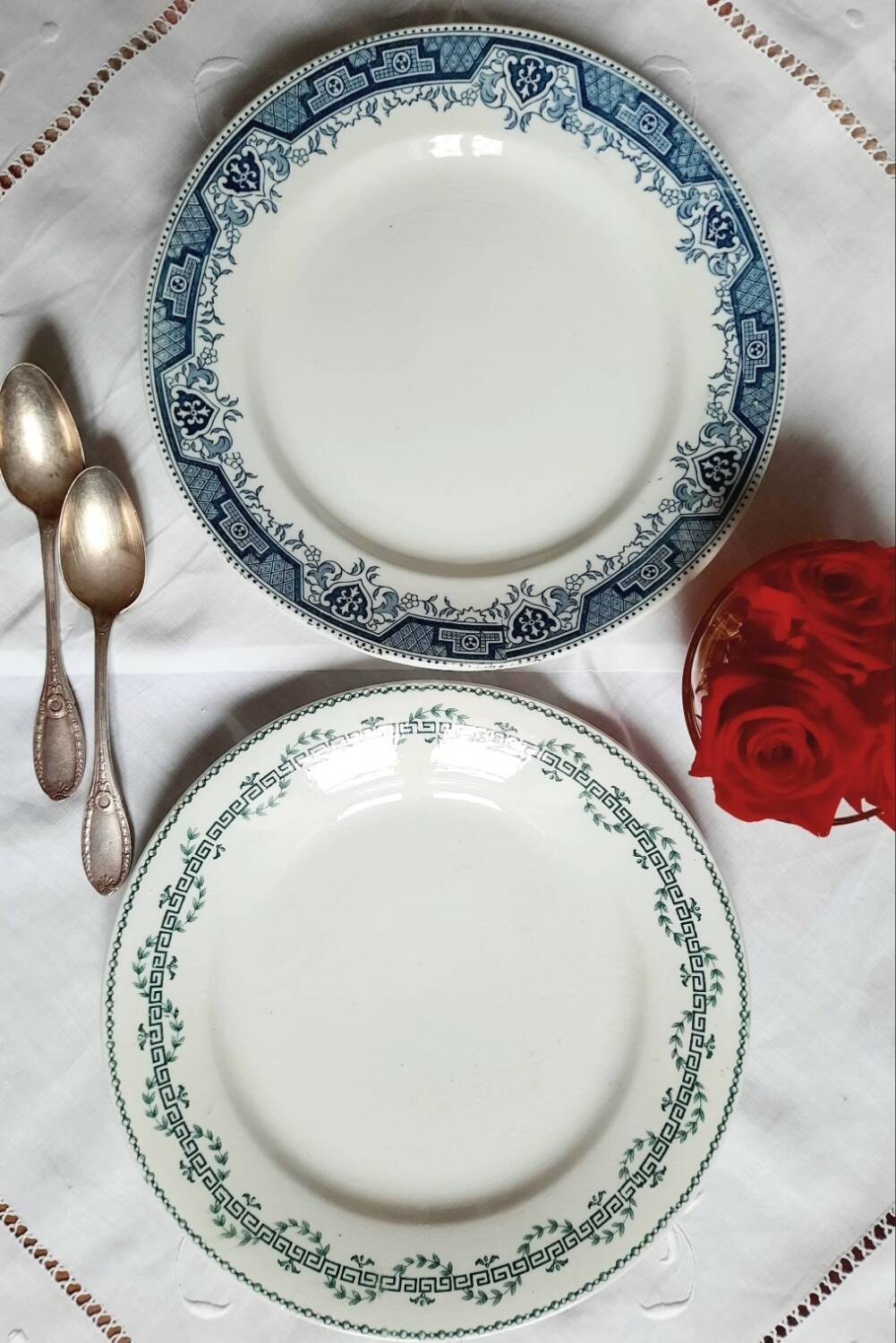 Old mismatched iron earthenware dessert plates accompanied by a dish