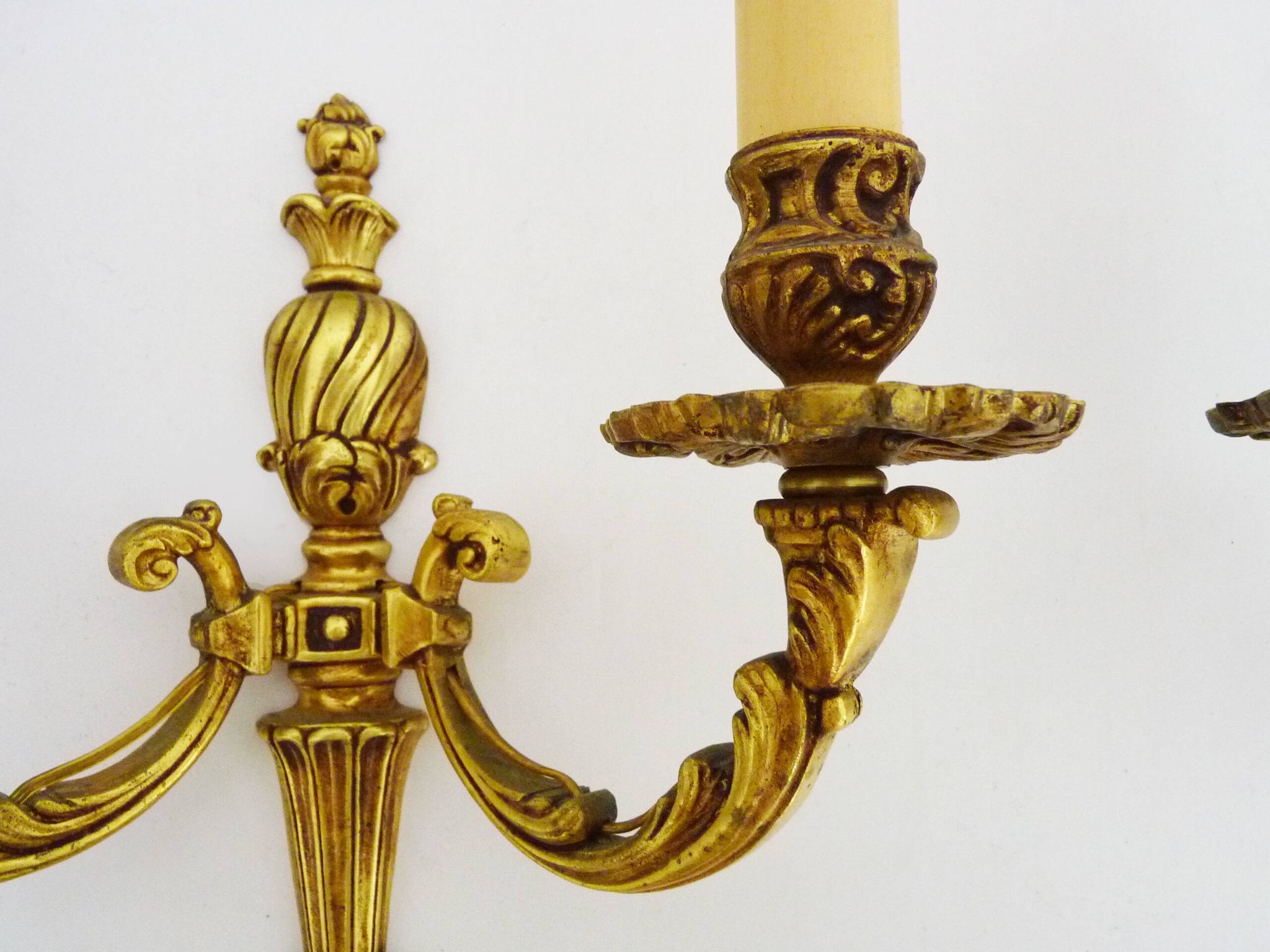Old pair of bronze double-light wall sconces. 60s