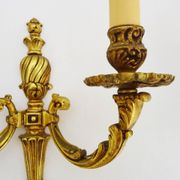 Old pair of bronze double-light wall sconces. 60s