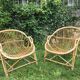 A pair of rattan armchairs