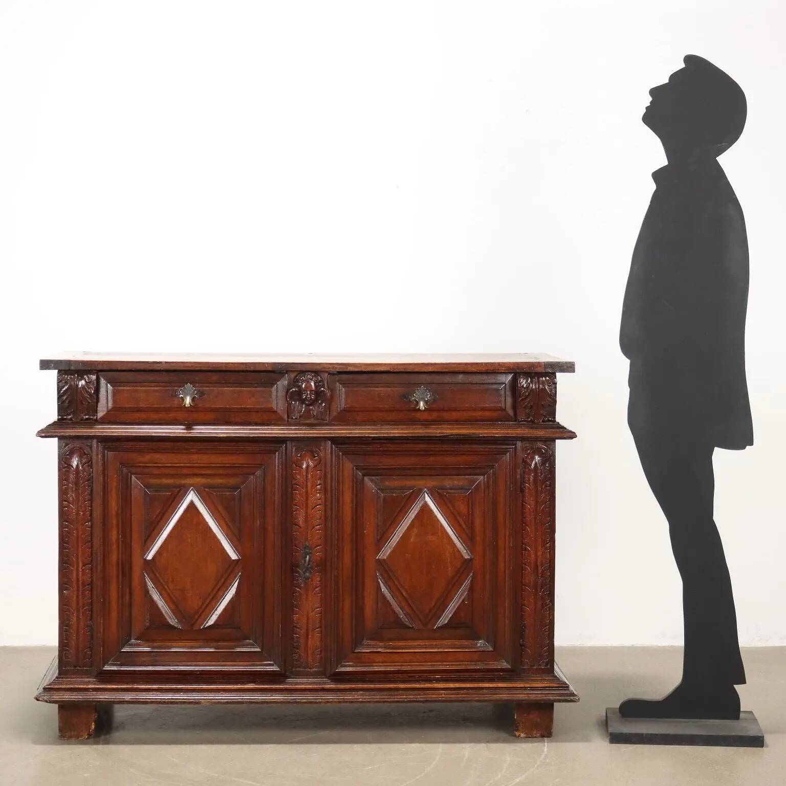 Ancient baroque walnut buffet with decorations, 18th century