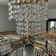 Brass chandelier and crystal tassel waterfall