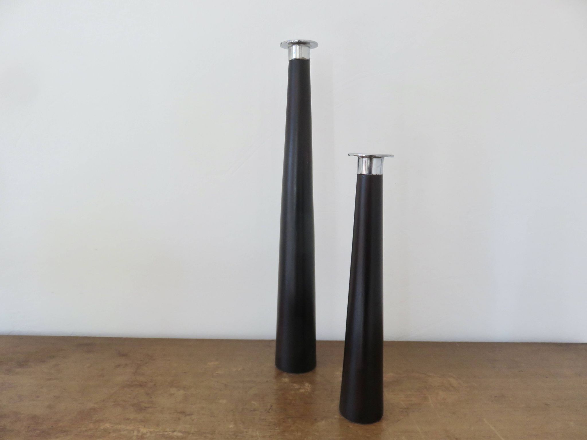 Pair of designer candlesticks, XXL, tapered, teak and chrome metal, 1980s
