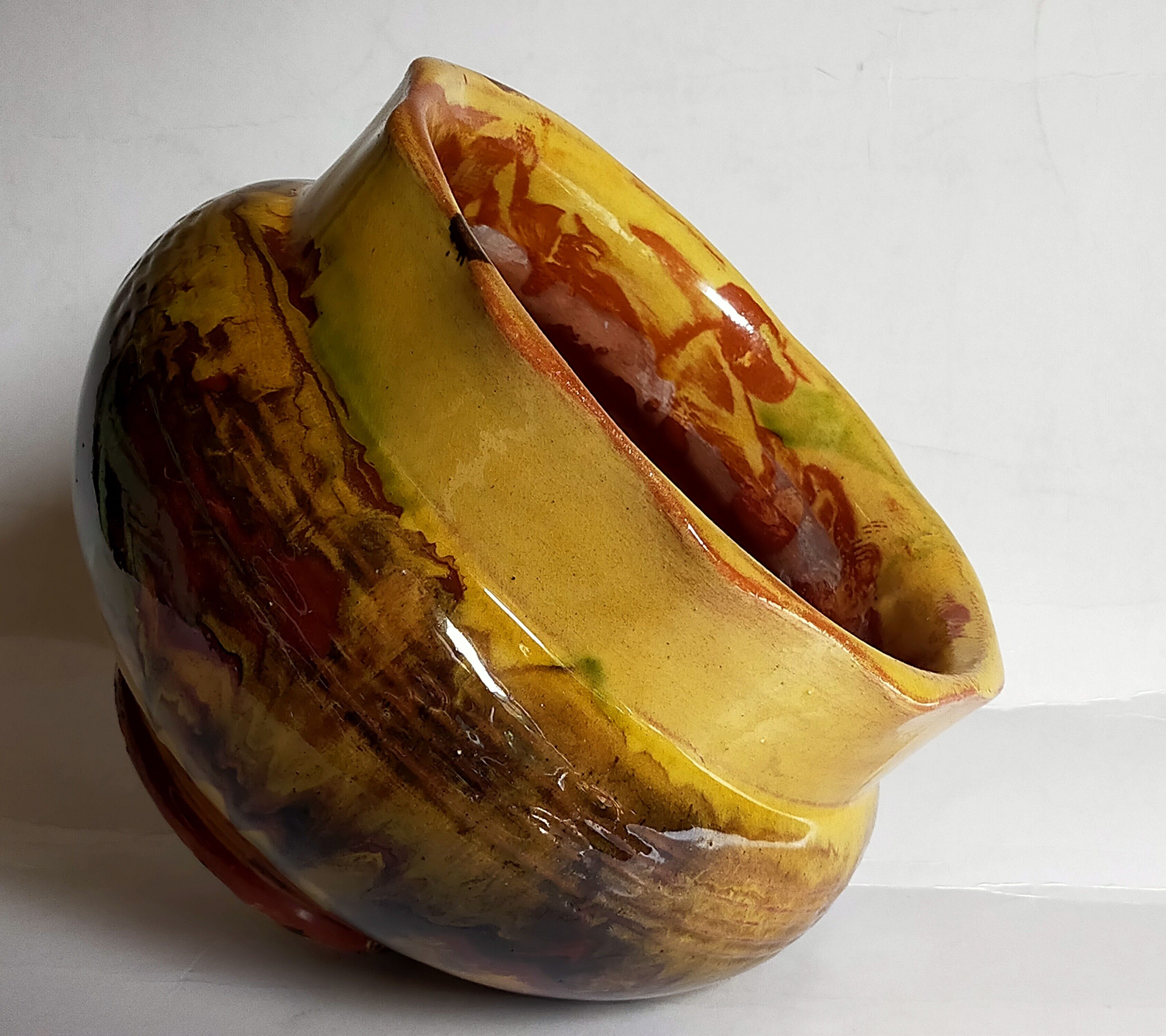 Old provencal pot cover in glazed terracotta