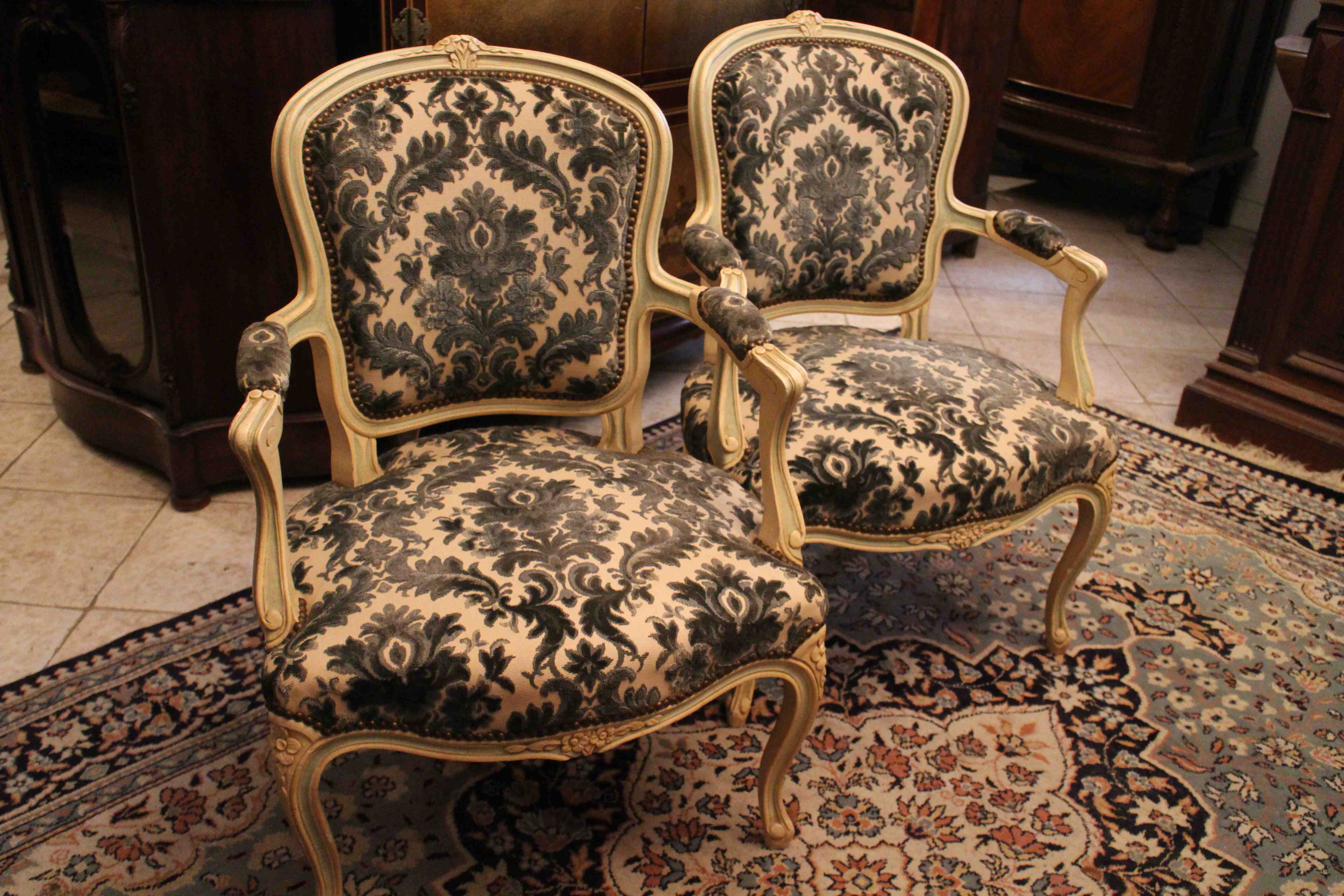 Pair of Louis XV-style convertible armchairs