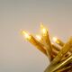 Pair of 24-light patinated brass chandeliers. 1980s.