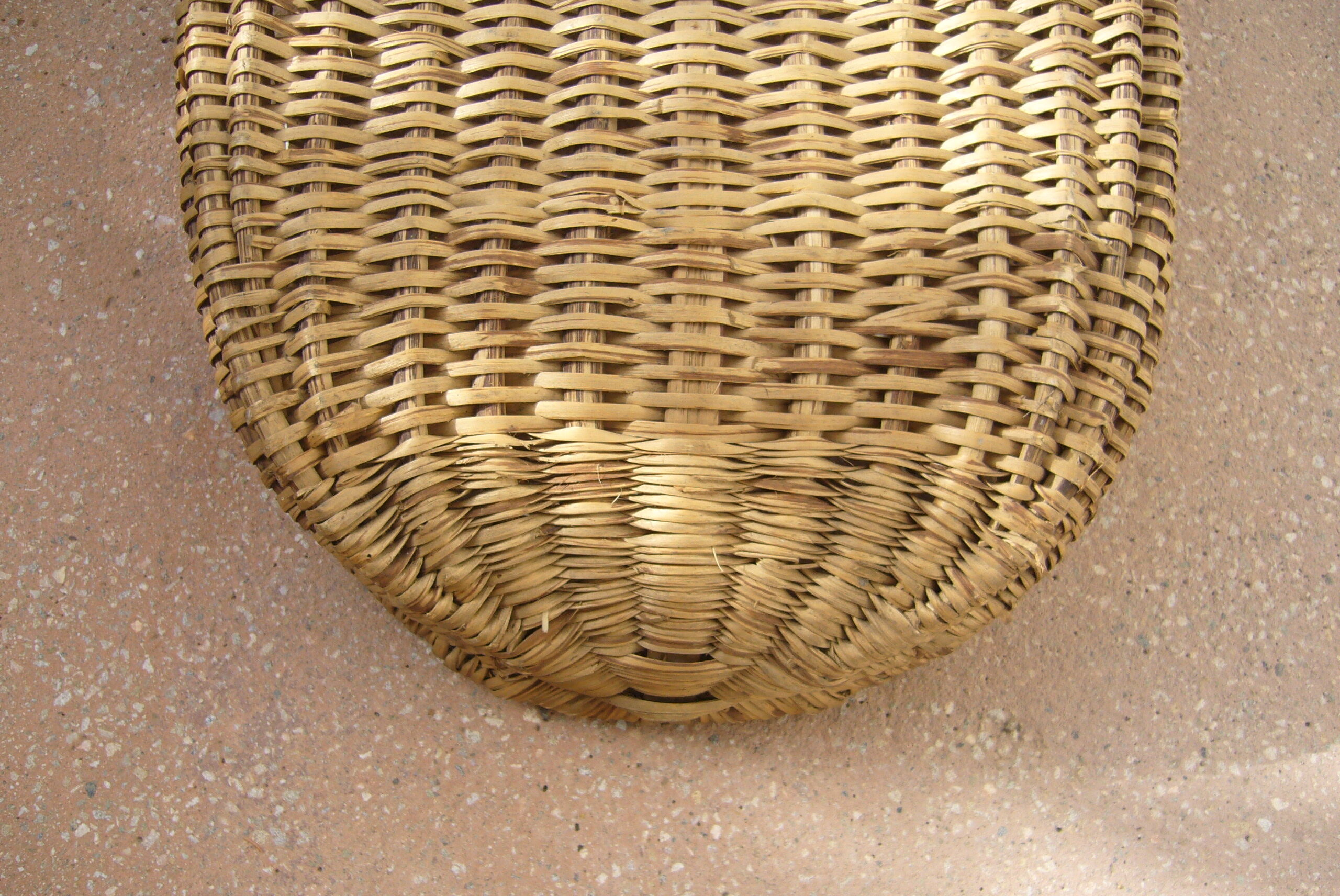 Old wicker laundry basket
