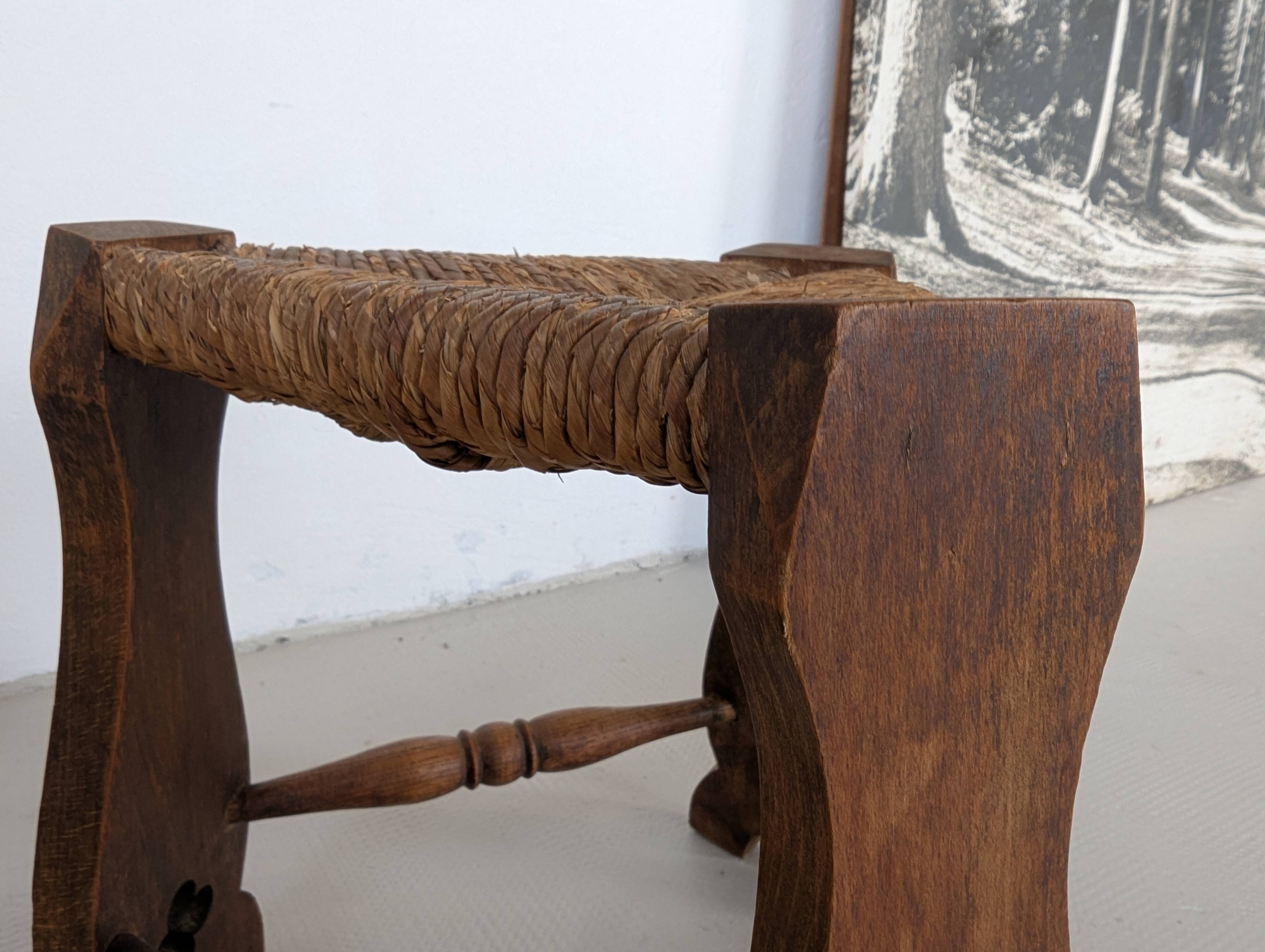 Low tripod farm stool in wood and straw