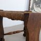 Low tripod farm stool in wood and straw